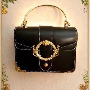 Striking Black and Gold Women's Bag with Chain Strap